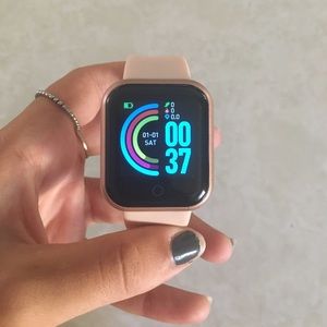 A slightly used rose gold Smartwatch